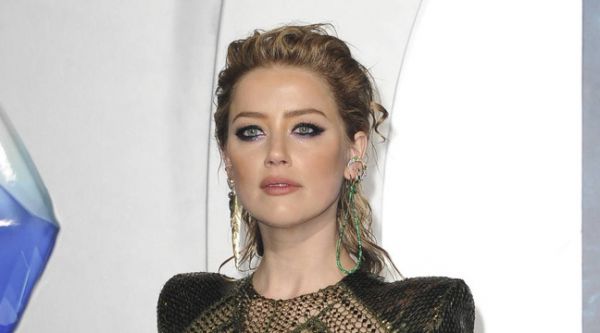 Amber Heard répond à Johnny Depp qui l'accuse d'infidélité