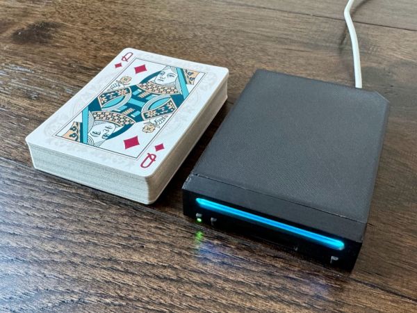 Cette Wii fait la taille d'un jeu de cartes