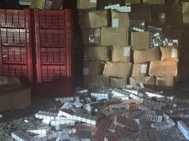 Haïti - RD : Saisie de plus de 100,000 paquets de cigarettes de contrebande en provenance d'Haïti